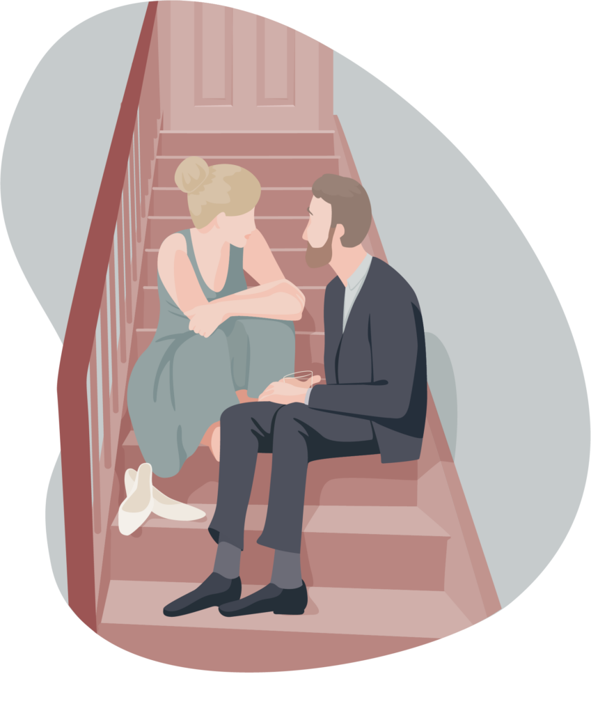 Par, der sidder paa trappe og snakker sammen